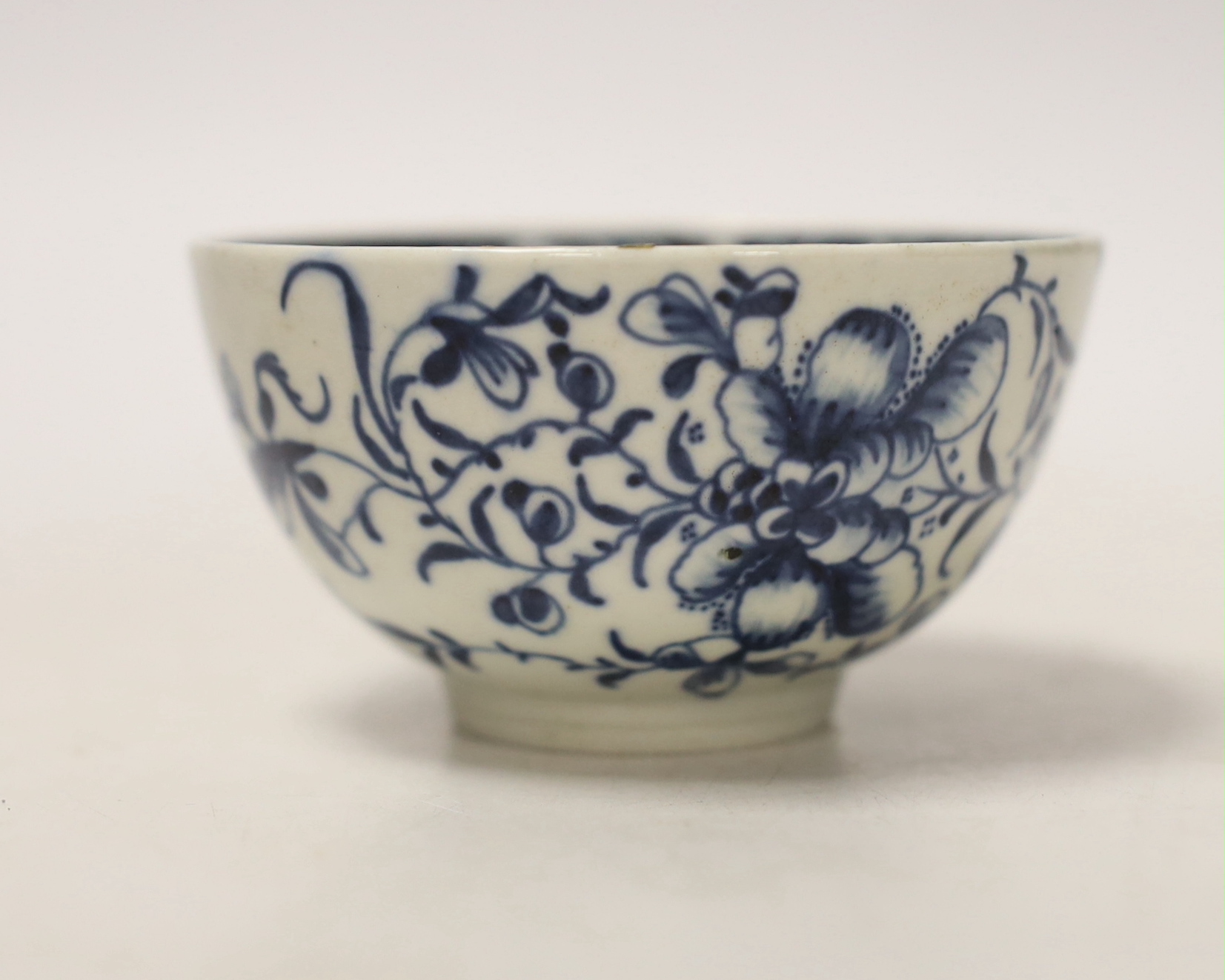 A Worcester tea bowl, Mansfield pattern and a saucer, Fruit and Flower pattern